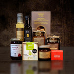 Gourmet Pantry gift set featuring Yoghurt, Olive Oil & Raisin Biscuits, White Balsamic Vinegar, Premium Greek Extra Virgin Olive Oil, Mandarin Marmalade, Organic Fig Marmalade, Olive Tapenade, Pomegranate Pearls, Raspberry & Ouzo Jam and Peppermint Tea.