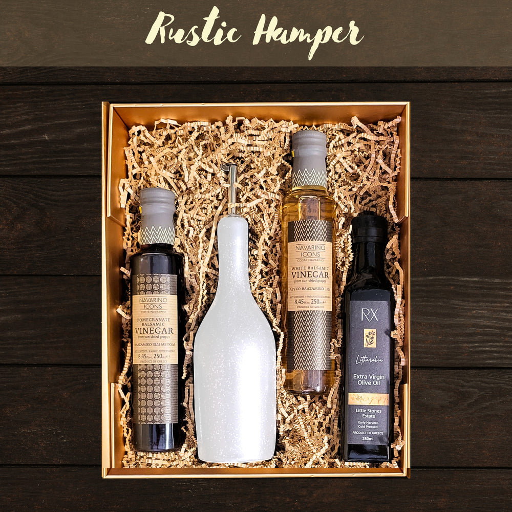 Reminiscent of a Mediterranean sun-drenched field, our Rustic Hamper features the very best in Mediterranean staples including premium Balsamic Vinegars, Extra Virgin Olive Oil and the exquisite, hand-made French 'Tourron Ceramic' Oil Jar.